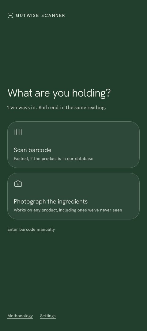 GutWise scanner start screen asking What are you holding, with barcode and photo options