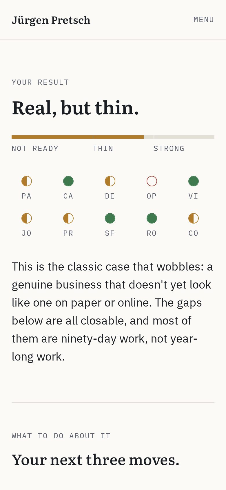 E-2 Reality Check result on a phone: the verdict Real, but thin, with ten traffic-light rows